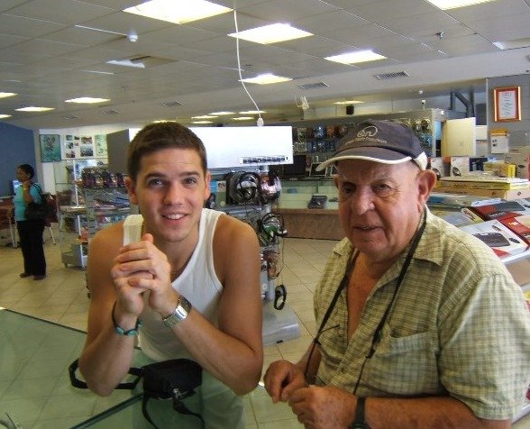 Eitan with his grandfather in a camera shop